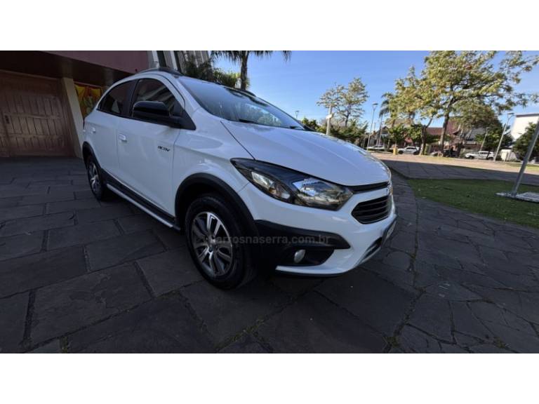 CHEVROLET - ONIX - 2017/2017 - Bronze - R$ 65.950,00
