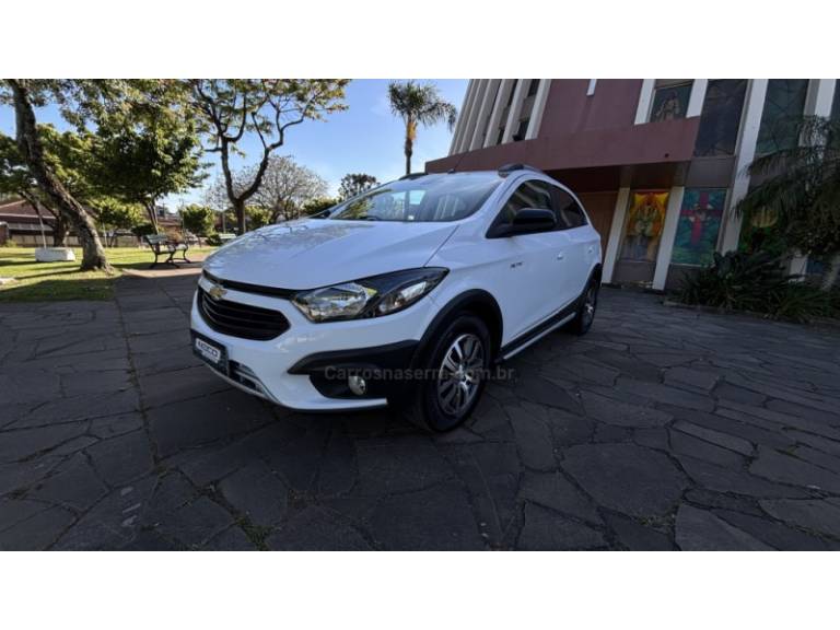 CHEVROLET - ONIX - 2017/2017 - Bronze - R$ 65.950,00