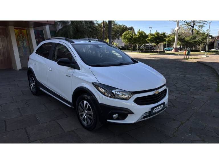 CHEVROLET - ONIX - 2017/2017 - Bronze - R$ 65.950,00